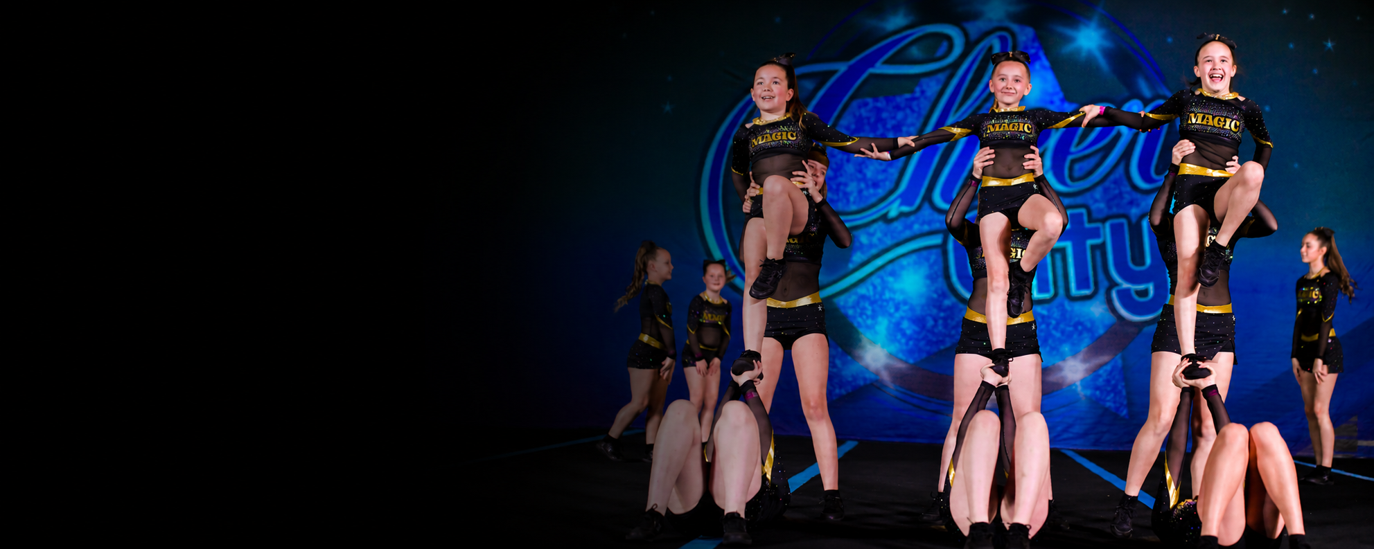 Magic Allstars competition athletes performing a pyramid